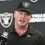 
              FILE - Las Vegas Raiders head coach Jon Gruden meets with the media following an NFL football game against the Pittsburgh Steelers in Pittsburgh, Sunday, Sept. 19, 2021. Former Raiders coach Jon Gruden says he is “ashamed” about his old offensive emails that cost him his job and hopes to get another chance in football. Gruden spoke publicly Tuesday, Aug. 30 about the affair at the Little Rock Touchdown Club for the first time since he resigned as coach of the Raiders last October.(AP Photo/Don Wright, File)
            