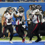 
              FILE - Atlanta Falcons wide receiver Jared Bernhardt (83) celebrates his touchdown catch against the Detroit Lions during a preseason NFL football game in Detroit, Friday, Aug. 12, 2022.  Just two years after being honored as the nation’s top college lacrosse player, Bernhardt is trying to make it as an NFL receiver with the Atlanta Falcons.  (AP Photo/Paul Sancya, File)
            