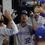 
              Kansas City Royals' Nick Pratto is congratulated in the dugout after his home run off Chicago White Sox starting pitcher Lucas Giolito during the second inning of a baseball game Tuesday, Aug. 30, 2022, in Chicago. (AP Photo/Charles Rex Arbogast)
            
