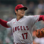 
              Los Angeles Angels pitcher Shohei Ohtani throws against the Detroit Tigers in the fourth inning of a baseball game in Detroit, Sunday, Aug. 21, 2022. (AP Photo/Paul Sancya)
            