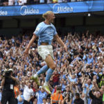 
              Manchester City's Erling Haaland celebrates scoring his side fourth goal of the game to complete his hat trick during the English Premier League match between Crystal Palace and Manchester City at the Etihad Stadium in Manchester, England, Saturday Aug. 27, 2022. (Nick Potts/PA via AP)
            