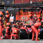 
              Crew work on the car of Ferrari driver Charles Leclerc of Monaco during the Formula One Grand Prix at the Spa-Francorchamps racetrack in Spa, Belgium, Sunday, Aug. 28, 2022. (AP Photo/Geert Vanden Wijngaert, Pool)
            