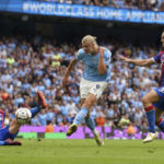 
              Manchester City's Erling Haaland scores his side fourth goal of the game to complete his hat trick during the English Premier League match between Crystal Palace and Manchester City at the Etihad Stadium in Manchester, England, Saturday Aug. 27, 2022. (Nick Potts/PA via AP)
            