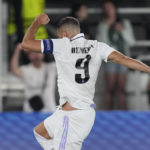 
              Real Madrid's Karim Benzema celebrates after scoring his side's second goal during the UEFA Super Cup final soccer match between Real Madrid and Eintracht Frankfurt at Helsinki's Olympic Stadium, Finland, Wednesday, Aug. 10, 2022. (AP Photo/Antonio Calanni)
            