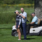 
              USA's Nelly Korda receives treatment at the side of the fairway of the sixth hole during the CP Women's Open golf tournament, Saturday, Aug. 27, 2022, in Ottawa, Ontario. (Justin Tang/The Canadian Press via AP)
            