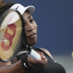 
              Serena Williams, of the United States, hits a return to Belinda Bencic, of Switzerland, during the National Bank Open tennis tournament Wednesday, Aug. 10, 2022, in Toronto. (Nathan Denette/The Canadian Press via AP)
            