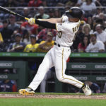 
              Pittsburgh Pirates' Bryan Reynolds hits a two-run home run against the Boston Red Sox during the fifth inning of a baseball game Thursday, Aug. 18, 2022, in Pittsburgh. (AP Photo/Philip G. Pavely)
            