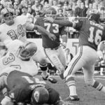 
              FILE - Kansas City Chiefs quarterback Len Dawson gets ready to launch a pass during an NFL football game against the Oakland Raiders in Kansas City, Mo., Nov. 2, 1970. Hall of Fame quarterback Len Dawson, who helped the Kansas City Chiefs to a Super Bowl title, died Wednesday, Aug. 24, 2022. He was 87. (AP Photo/William P. Straeter, File)
            