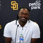 
              San Diego Padres first baseman Josh Bell smiles during a news conference at Petco Park Wednesday, Aug. 3, 2022, in San Diego. Bell was acquired, along with outfielder Juan Soto, from the Washington Nationals. (AP Photo/Gregory Bull)
            