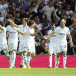 
              Leeds United's Rodrigo, left, celebrates scoring their side's second goal of the game during the English Premier League soccer match between Leeds United and Chelsea at Elland Road, Leeds, England, Sunday, Aug. 21, 2022. (Nigel French/PA via AP)
            