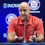 
              Washington Nationals general manager Mike Rizzo speaks with reporters about the team's recent trades before a baseball game against the New York Mets at Nationals Park, Tuesday, Aug. 2, 2022, in Washington. (AP Photo/Alex Brandon)
            