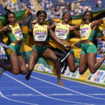 
              Jamaica's women's 4 x 100 meters relay final team celebrate their bronze medal during the athletics in the Alexander Stadium at the Commonwealth Games in Birmingham, England, Sunday, Aug. 7, 2022. (AP Photo/Manish Swarup)
            