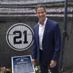 
              Retired New York Yankees player Paul O'Neill stands next to his number in Monument Park during a number retirement ceremony before a baseball game between the Yankees and the Toronto Blue Jays, Sunday, Aug. 21, 2022, in New York. (AP Photo/Corey Sipkin)
            