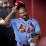 
              St. Louis Cardinals' Albert Pujols (5) laughs in the dugout after getting caught stealing second during the sixth inning of a baseball game against the Arizona Diamondbacks, Saturday, Aug. 20, 2022, in Phoenix. (AP Photo/Matt York)
            