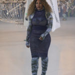 
              FILE - Serena Williams wears a creation as part of the Off-White Ready To Wear Fall/Winter 2022-2023 fashion collection, unveiled during the Fashion Week in Paris, Monday, Feb. 28, 2022. (Photo by Vianney Le Caer/Invision/AP, File)
            