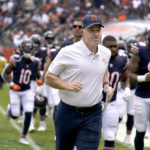 
              Chicago Bears head coach Matt Eberflus jogs off the field at halftime of an NFL preseason football game between the Bears and the Kansas City Chiefs Saturday, Aug. 13, 2022, in Chicago. (AP Photo/Nam Y. Huh)
            