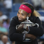 
              FILE - Serena Williams, of the United States, hugs the championship trophy after defeating Caroline Wozniacki, of Denmark, during the championship match of the 2014 U.S. Open tennis tournament, Sunday, Sept. 7, 2014, in New York. Saying “the countdown has begun,” 23-time Grand Slam champion Serena Williams said Tuesday, Aug. 9, 2022, she is ready to step away from tennis so she can turn her focus to having another child and her business interests, presaging the end of a career that transcended sports.(AP Photo/Mike Groll, File)
            