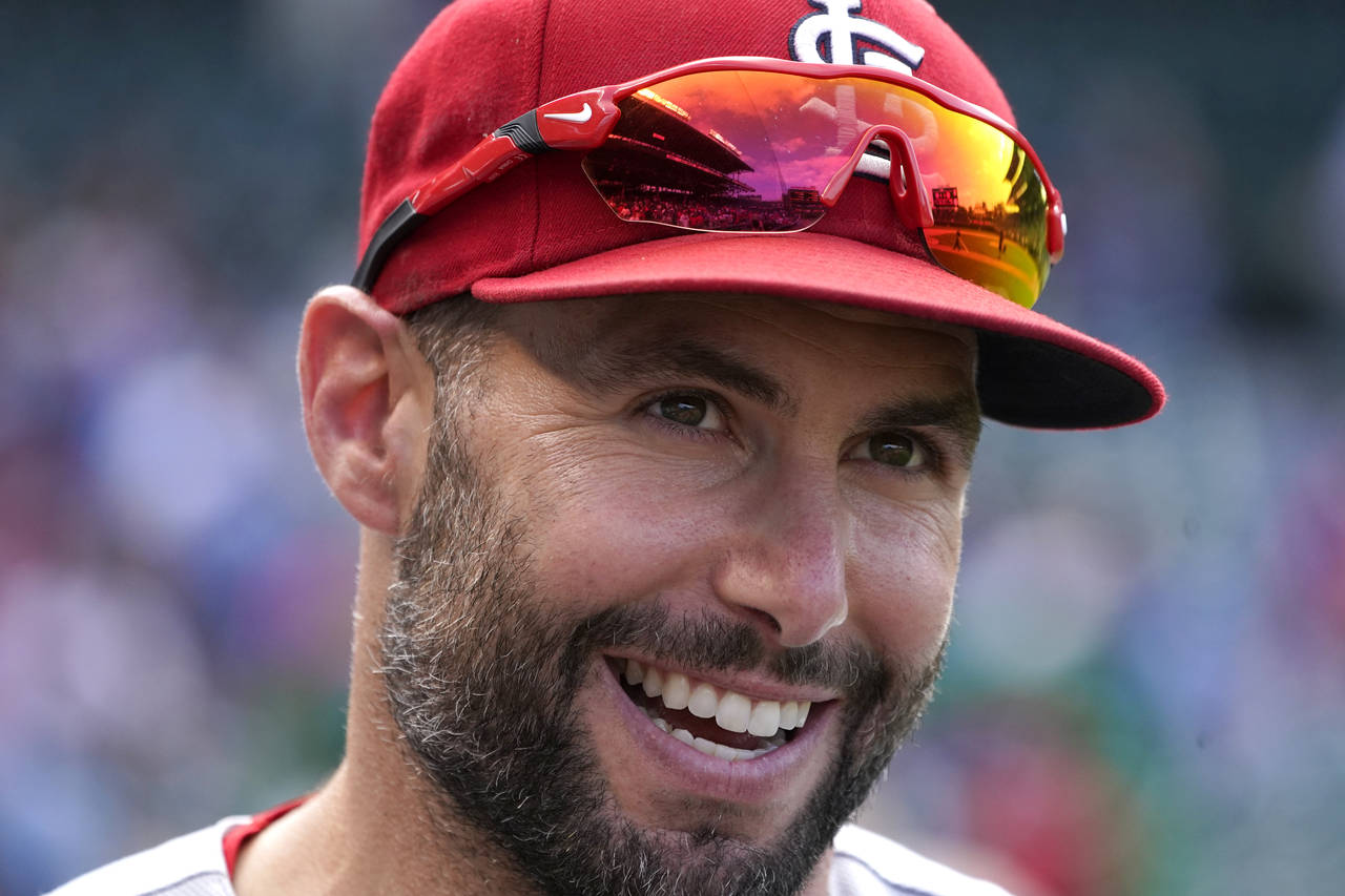 St. Louis Cardinals first baseman Paul Goldschmidt smiles as he give a radio interview after a base...