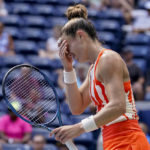 
              Maria Sakkari, of Greece, reacts after losing a point to Wang Xiyu, of China, during the second round of the US Open tennis championships, Wednesday, Aug. 31, 2022, in New York. (AP Photo/John Minchillo)
            