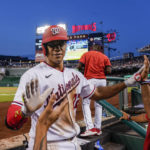 
              Washington Nationals' Juan Soto celebrates after his solo home run during the fourth inning of a baseball game against the New York Mets at Nationals Park, Monday, Aug. 1, 2022, in Washington. (AP Photo/Alex Brandon)
            