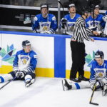 
              Finland defensemen Joni Jurmo, left, and Kasper Puutio react after losing to Canada during overtime IIHF world junior hockey championship gold medal game action in Edmonton, Alberta, Saturday, Aug. 20, 2022. (Jeff McIntosh/The Canadian Press via AP)
            