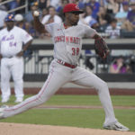 
              Cincinnati Reds' Justin Dunn pitches during the during first inning of a baseball game against New York Mets, Monday, Aug. 8, 2022, in New York. (AP Photo/Bebeto Matthews)
            