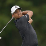 
              Xander Schauffele hits from the seventh tee during the final round of the BMW Championship golf tournament at Wilmington Country Club, Sunday, Aug. 21, 2022, in Wilmington, Del. (AP Photo/Julio Cortez)
            