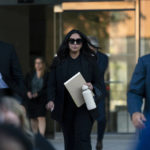 
              Vanessa Bryant, center, the widow of Kobe Bryant, leaves a federal courthouse in Los Angeles, Wednesday, Aug. 10, 2022. Kobe Bryant's widow is taking her lawsuit against the Los Angeles County sheriff's and fire departments to a federal jury, seeking compensation for photos deputies shared of the remains of the NBA star, his daughter and seven others killed in a helicopter crash in 2020. (AP Photo/Jae C. Hong)
            