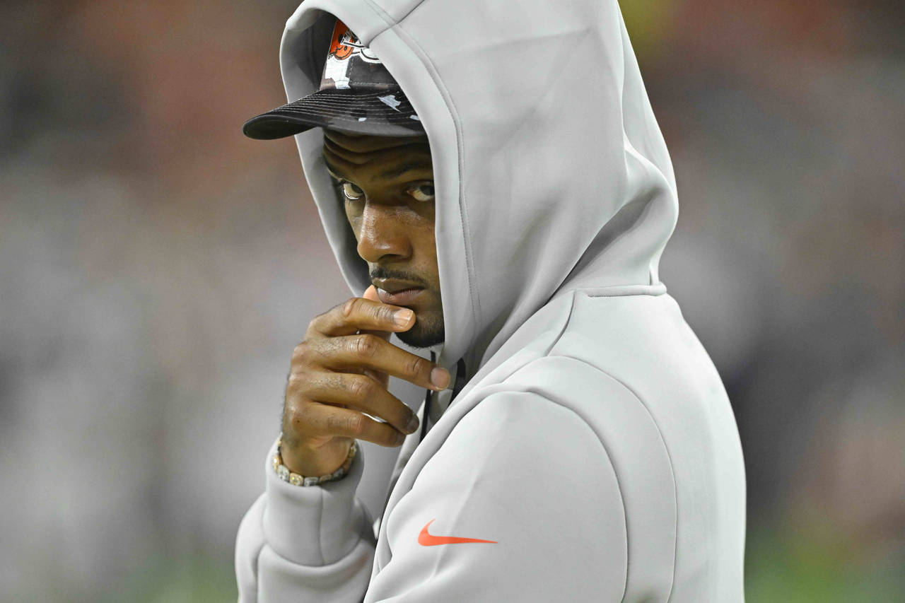 Cleveland Browns quarterback Deshaun Watson (4) walks along the sideline during the second half of ...