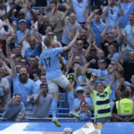 
              Manchester City's Kevin De Bruyne celebrates after scoring his side's second goal during the English Premier League soccer match between Manchester City and Bournemouth at Etihad stadium in Manchester, England, Saturday, Aug. 13, 2022. (AP Photo/Jon Super)
            