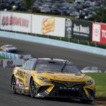 
              Christopher Bell makes his way through the Esses during a NASCAR Cup Series auto race in Watkins Glen, N.Y., Sunday, Aug. 21, 2022. (AP Photo/Seth Wenig)
            