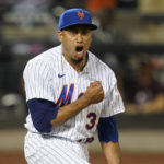 
              New York Mets relief pitcher Edwin Diaz (39) reacts after striking out Philadelphia Phillies' Nick Castellanos to close the ninth inning of a baseball game, Saturday, Aug. 13, 2022, in New York. (AP Photo/John Minchillo)
            