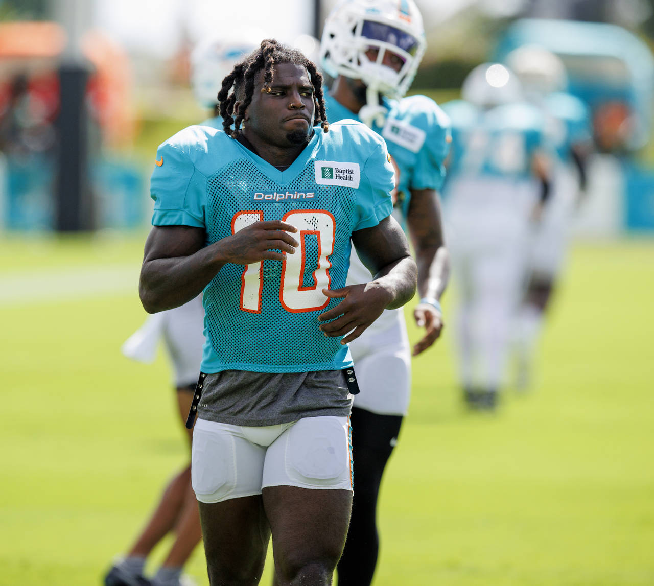 Miami Dolphins wide receiver Tyreek Hill (10) runs during an NFL football training camp with the Ph...