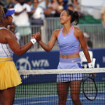 
              Naomi Osaka, of Japan, left, shakes hands after her win with Zheng Qinwen, of China, during their first round match at the Mubadala Silicon Valley Classic tennis tournament in San Jose, Calif., Tuesday, Aug. 2, 2022. (AP Photo/Josie Lepe)
            