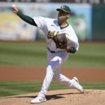 
              Oakland Athletics' Adrian Martinez pitches against the New York Yankees during the first inning of a baseball game in Oakland, Calif., Sunday, Aug. 28, 2022. (AP Photo/Jeff Chiu)
            
