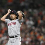 
              Boston Red Sox pitcher Hirkazu Sawamura pauses after giving up a two-run home run to the Baltimore Orioles during the fourth inning of a baseball game Friday, Aug. 19, 2022, in Baltimore. (AP Photo/Gail Burton)
            
