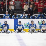
              Finland players sit dejected after losing to Canada after the world junior hockey championship gold medal game in Edmonton, Alberta, Saturday Aug. 20, 2022. (Jason Franson/The Canadian Press via AP)
            