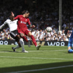 
              Liverpool's Darwin Nunez, second from left, scores during the English Premier League soccer match between Fulham and Liverpool at Craven Cottage stadium in London, Saturday, Aug. 6, 2022. (AP Photo/Ian Walton)
            