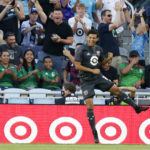 
              MLS All-Star Carlos Vela celebrates his goal during the first half of the MLS All-Star soccer match against Liga MX All-Stars on Wednesday, Aug. 10, 2022, in St. Paul, Minn. (AP Photo/Andy Clayton-King)
            