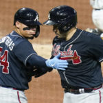 
              Atlanta Braves' Travis d'Arnaud, right, is greeted by William Contreras (24) after hitting a solo home run against the Pittsburgh Pirates during the fifth inning of a baseball game, Tuesday, Aug. 23, 2022, in Pittsburgh. (AP Photo/Keith Srakocic)
            