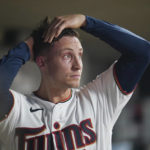 
              Minnesota Twins relief pitcher Griffin Jax (65) reacts after being pulled from the team's baseball game against the Detroit Tigers during the seventh inning Tuesday, Aug. 2, 2022, in Minneapolis. (AP Photo/Abbie Parr)
            