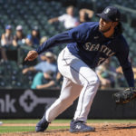 
              Seattle Mariners reliever Andres Munoz delivers a pitch during the eighth inning of a baseball game against the Cleveland Guardians, Thursday, Aug. 25, 2022, in Seattle. (AP Photo/Stephen Brashear)
            