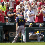 
              Milwaukee Brewers relief pitcher Taylor Rogers walks off the field after being removed during the eighth inning of a baseball game against the St. Louis Cardinals Sunday, Aug. 14, 2022, in St. Louis. (AP Photo/Jeff Roberson)
            