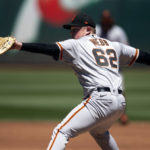 
              San Francisco Giants starting pitcher Logan Webb (62) delivers against the Oakland Athletics during the second inning of a baseball game, Sunday, Aug. 7, 2022, in Oakland, Calif. (AP Photo/D. Ross Cameron)
            