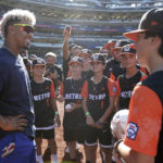 
              New York Mets' Francisco Lindor, left, talks with players of the Massapequa, N.Y.'s Little League World Series team before a baseball game against the Los Angeles Dodgers on Tuesday, Aug. 30, 2022, in New York. (AP Photo/Adam Hunger)
            