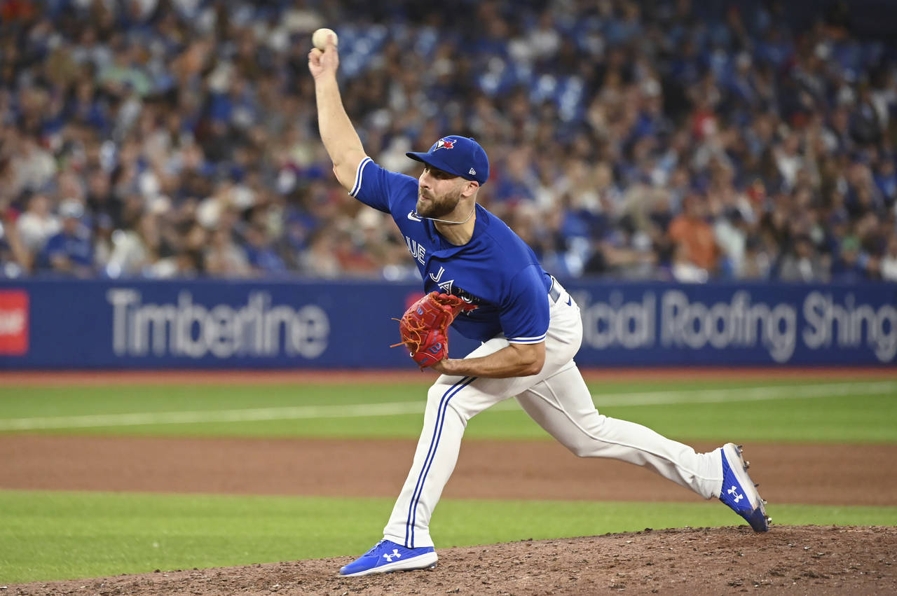 Toronto Blue Jays relief pitcher Anthony Bass throws to a Baltimore Orioles batter during the seven...