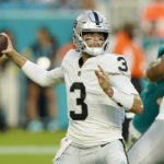 
              Las Vegas Raiders quarterback Jarrett Stidham (3) aims a pass during the first half of a NFL preseason football game against the Miami Dolphins, Saturday, Aug. 20, 2022, in Miami Gardens, Fla. (AP Photo/Wilfredo Lee)
            