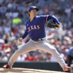 
              Texas Rangers starting pitcher Kohei Arihara (35) throws during the first inning of a baseball game against the Minnesota Twins, Sunday, Aug. 21, 2022, in Minneapolis. (AP Photo/Stacy Bengs)
            