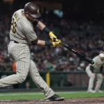 
              San Diego Padres' Austin Nola hits a two-run single against the San Francisco Giants during the fourth inning of a baseball game in San Francisco, Monday, Aug. 29, 2022. (AP Photo/Jeff Chiu)
            