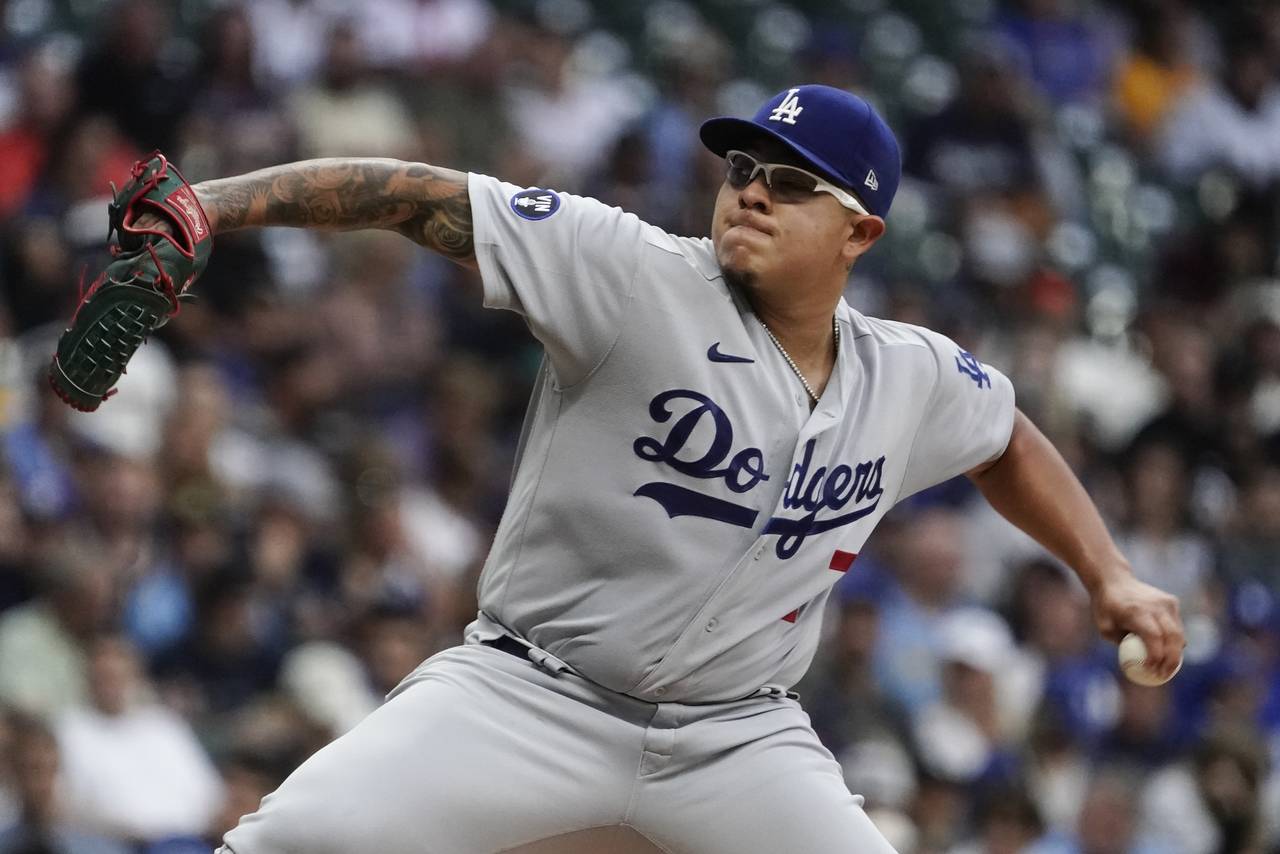 Los Angeles Dodgers starting pitcher Julio Urias throws during the first inning of a baseball game ...